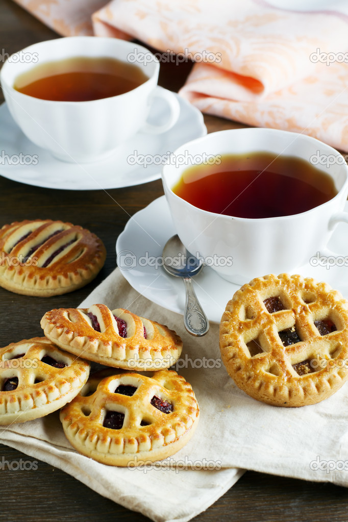 Cups of tea and biscuits — Stock Photo © marishu 31061245
