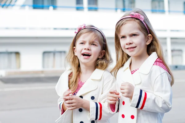 Two little sisters in port — Stock Photo, Image
