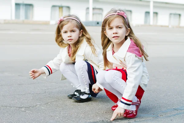 Two little sisters in port — Stock Photo, Image