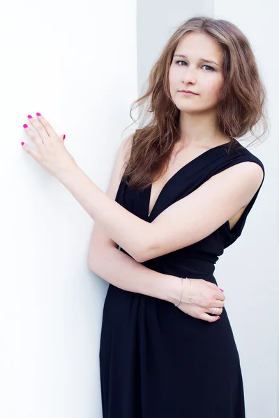 Girl in a long black dress — Stock Photo, Image