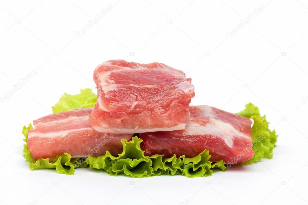Raw pork ribs and vegetables