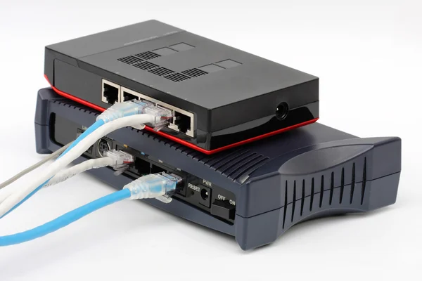 Ethernet-switch som isolerade och router modem ansluta lan på den vita bakgrunden — Stockfoto