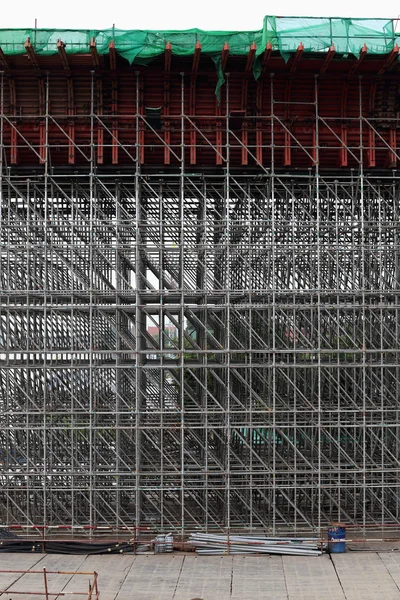 Large scaffolding. Metro construction in morning — Stock Photo, Image