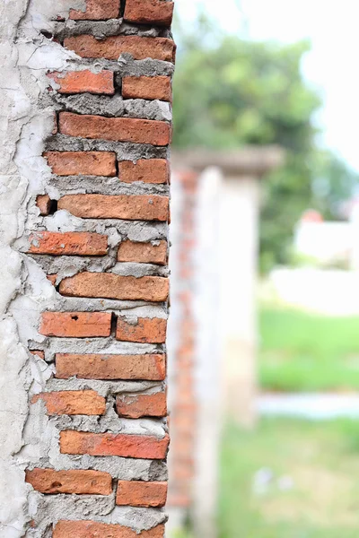 Red brick pillars are not plastered — Stock Photo, Image