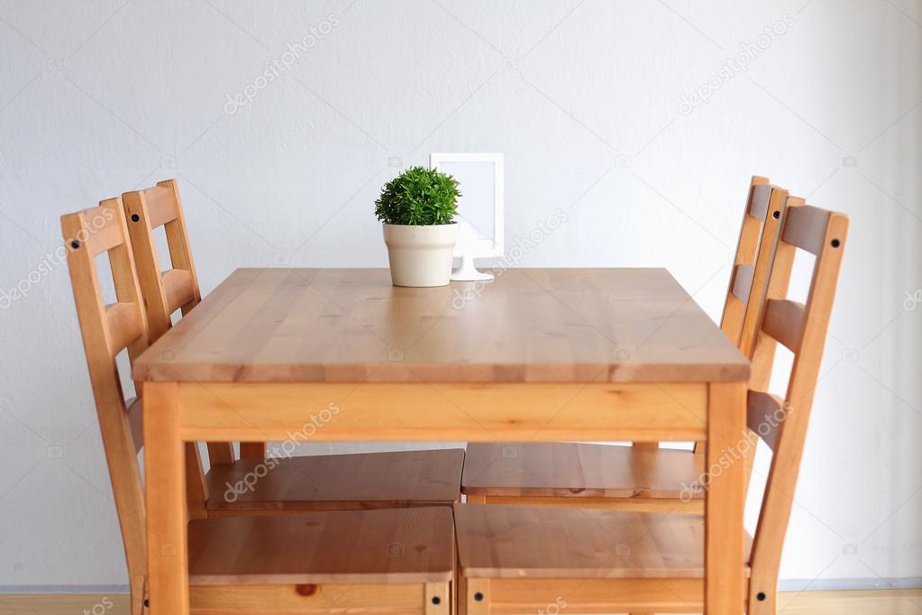 Wooden dining table — Stock Photo © myrainjom01 34118401