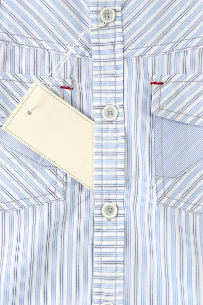 Etiqueta branca na camisa — Fotografia de Stock