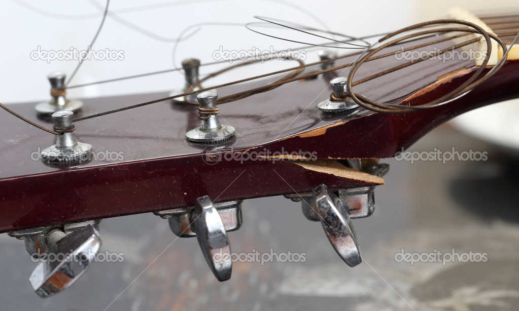 Very dilapidated old guitar