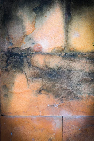Vecchie piastrelle di pietra con macchie — Foto Stock