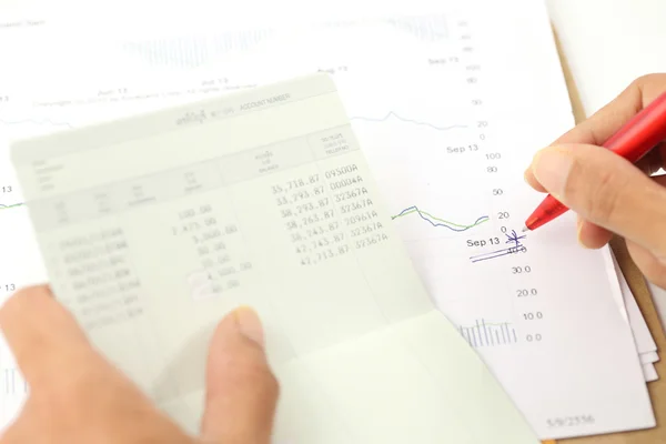 Account book report with hand of someone — Stock Photo, Image