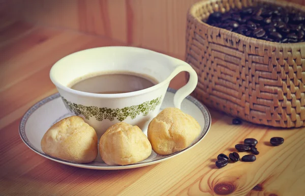 Sweet bread with coffee on the wooden — Stock Photo, Image