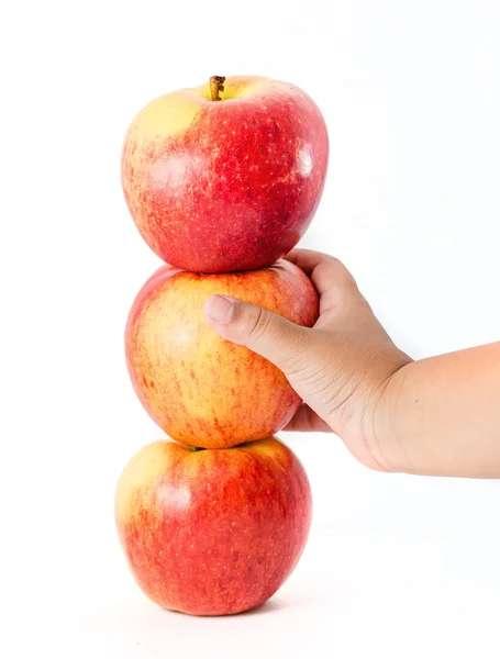 Primo piano immagine, Mano del bambino con le mele rosse — Foto Stock