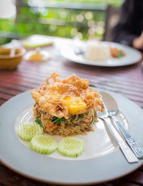 Basil Beef Fried Rice Topped with a fried egg — Stock Photo, Image