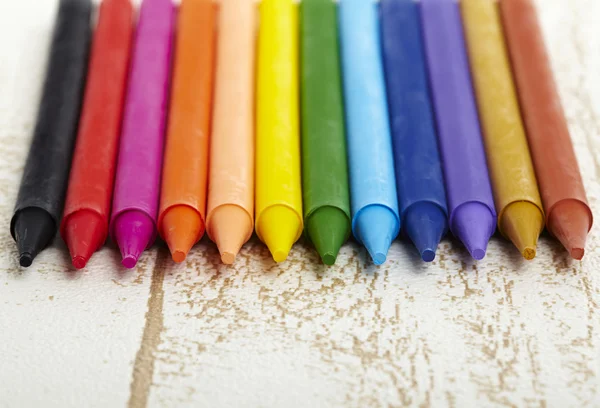 Twelve color pastel crayon in box close up with woody texture b — Stock Photo, Image