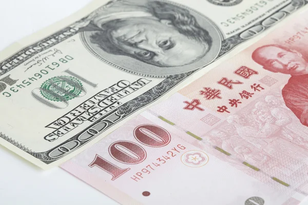 Ne piece of one hundred dollar of New Taiwan Dollar cash and one piece of twenty dollars of US case with white backuground close up — Stock Photo, Image