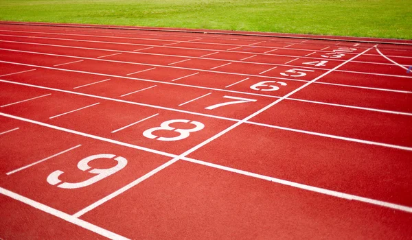 Pista de corridas em vermelho — Fotografia de Stock