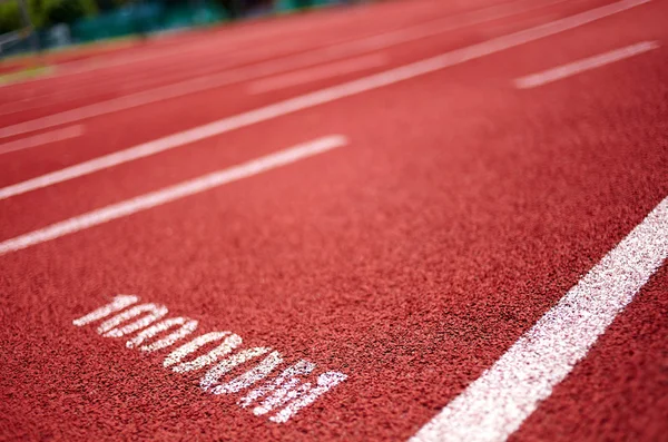 Pista de corridas em vermelho — Fotografia de Stock