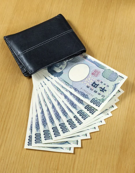 10 peices de o mie japonez cashes portofel aproape — Fotografie, imagine de stoc