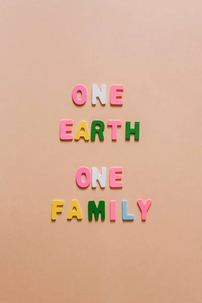 One Earth One Family Concept Decorative Letters — Stock Photo, Image