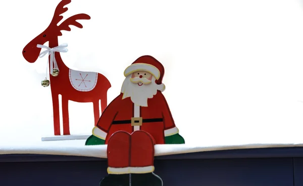 Weihnachtsmann-Klausel mit Elch — Stockfoto