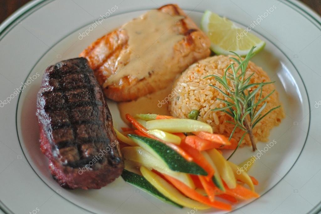 Steak and Salmon Dinner — Stock Photo © RolfJuario #28504437
