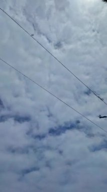 Short vertical video of the scenery of the shore of the atlantic ocean in Lisbon, Portugal in summer of 2022.