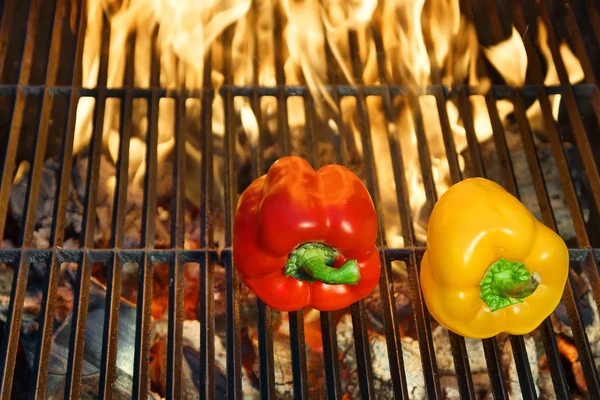 Colorful Bell peppers on the hot BBQ cast iron grill — Stock Photo, Image