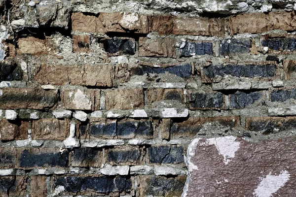 垃圾砖砌墙的背景下，xxxl — 图库照片