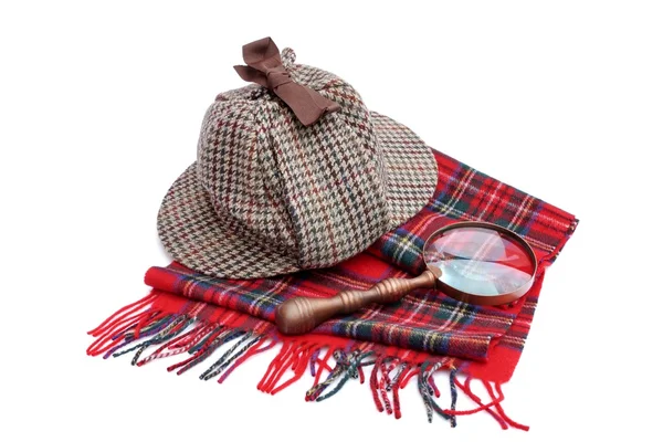 Cacciatore di cervi o Sherlock Holmes cappuccio, lente d'ingrandimento, tartan — Foto Stock