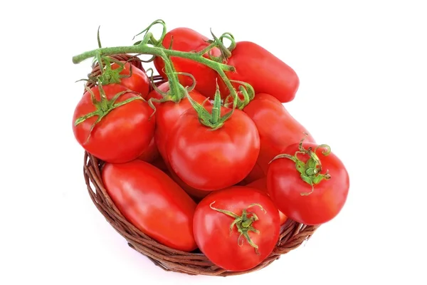 Different Ripe Tomatoes in wicker basket — Stock Photo, Image