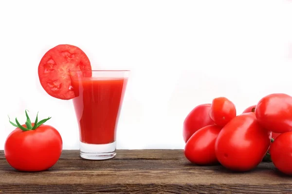 Tomato Juice on wooden board — Stock Photo, Image