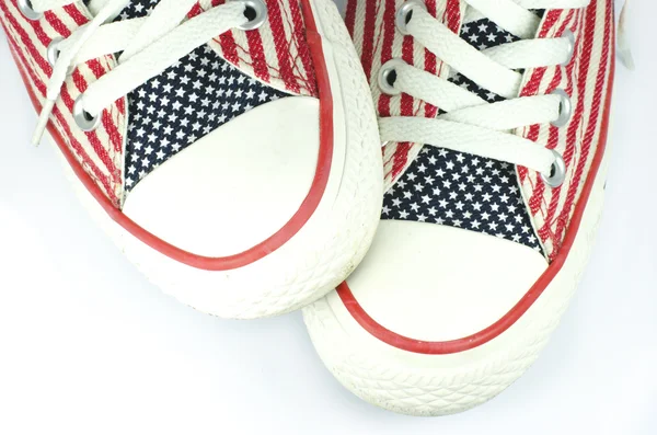 Pair of shoes with american stars and stripes decoration — Stock Photo, Image