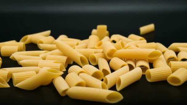 Slow Motion Falling Raw Uncooked Penne Maccaroni Pasta Italian Healthy — Stock Video