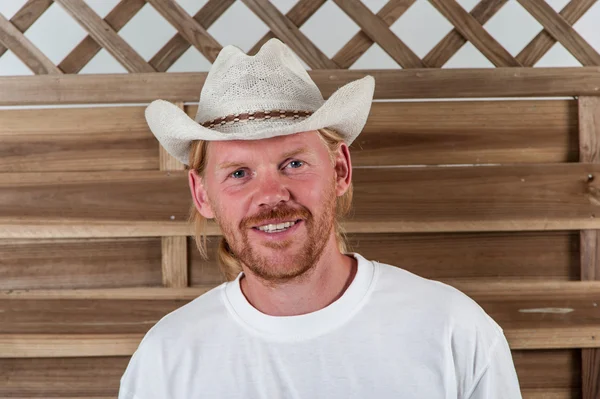 Serious man in white hat — Stock Photo, Image