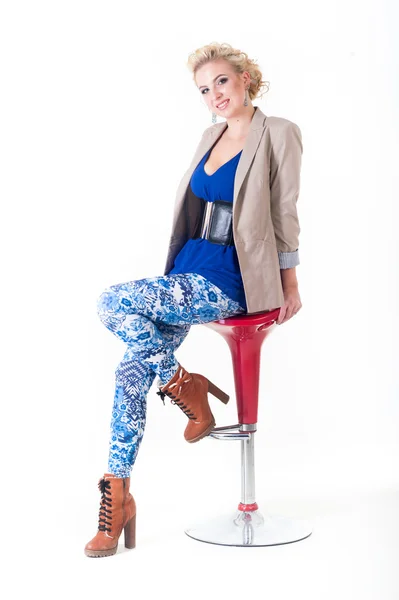 Young woman on bar seat — Stock Photo, Image