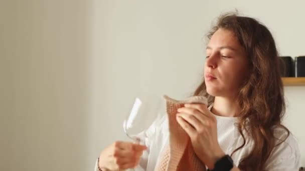 Young Brunette Woman Hostess Wiping Wine Glass Water Looking Dirt — 图库视频影像