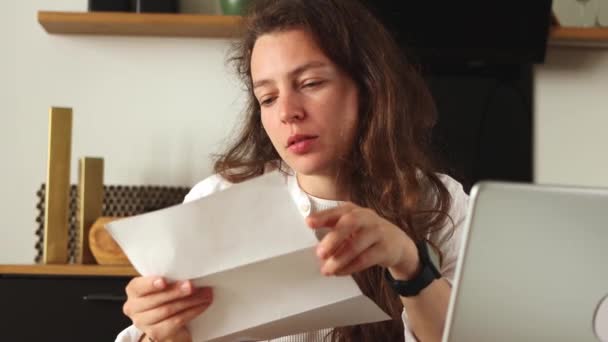 Happy Brunette Girl Opening Paper Correspondence Letter Reading Good News — 비디오
