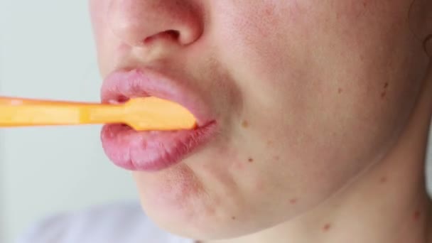 Cropped Young Woman Start Brush Her Teeth Using Orange Toothbrush — Stockvideo