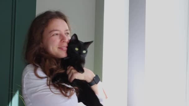 Young Beautiful Brunette Woman Holding Her Black Cat Playing Looking — Video