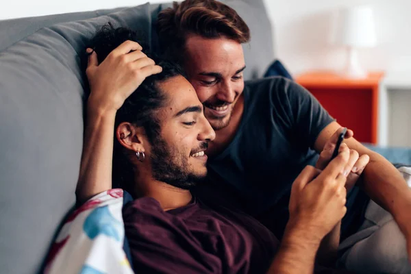 Gay Couple Bed Home Hotel Room Using Smartphone — Stock Photo, Image