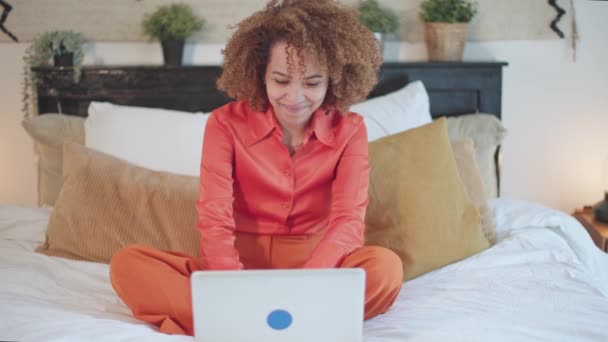 Biracial Female Manager Hotel Bedroom Working Abroad Connected Using Laptop — Stock video