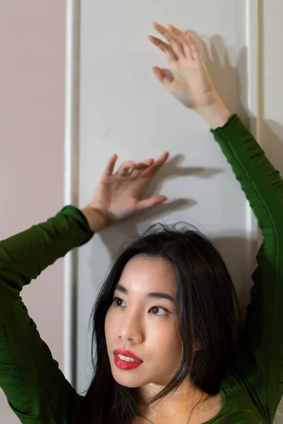 Vertical Portrait Young Asian Lady Raised Arms Wall Red Lipstick — Fotografie, imagine de stoc