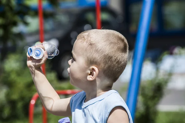 Child and soap bubbles — Stock Photo, Image