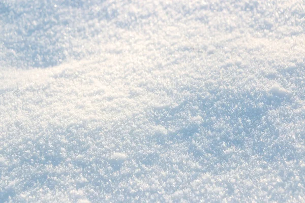 White snow background with blurring back and beautiful light