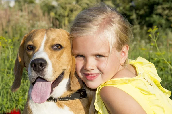 Little girl with a dog — Stock Photo, Image