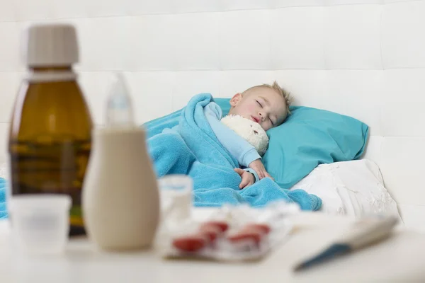 Sleeping boy with his toy — Stock Photo, Image