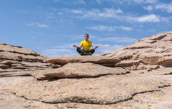 Man meditates in nature — Stock Photo, Image