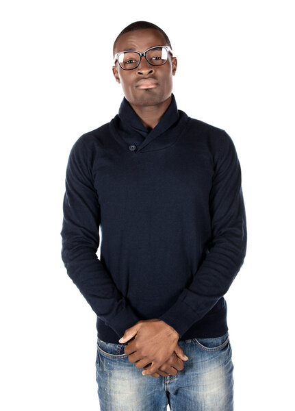 Handsome young fashionable attractive african man wearing nerdy glasses, a dark blue jersey and jeans.