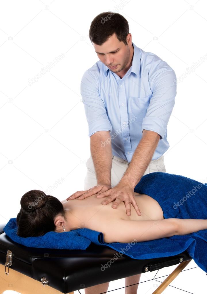 Physiotherapist massaging patient