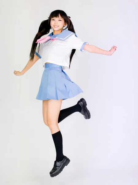 Jumping Japanese style student girl asia cosplay lolita — Stock Photo, Image