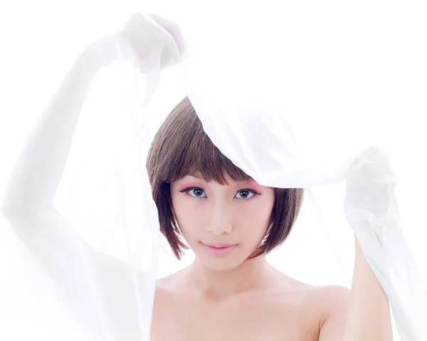 Menina vestida com um pano branco — Fotografia de Stock